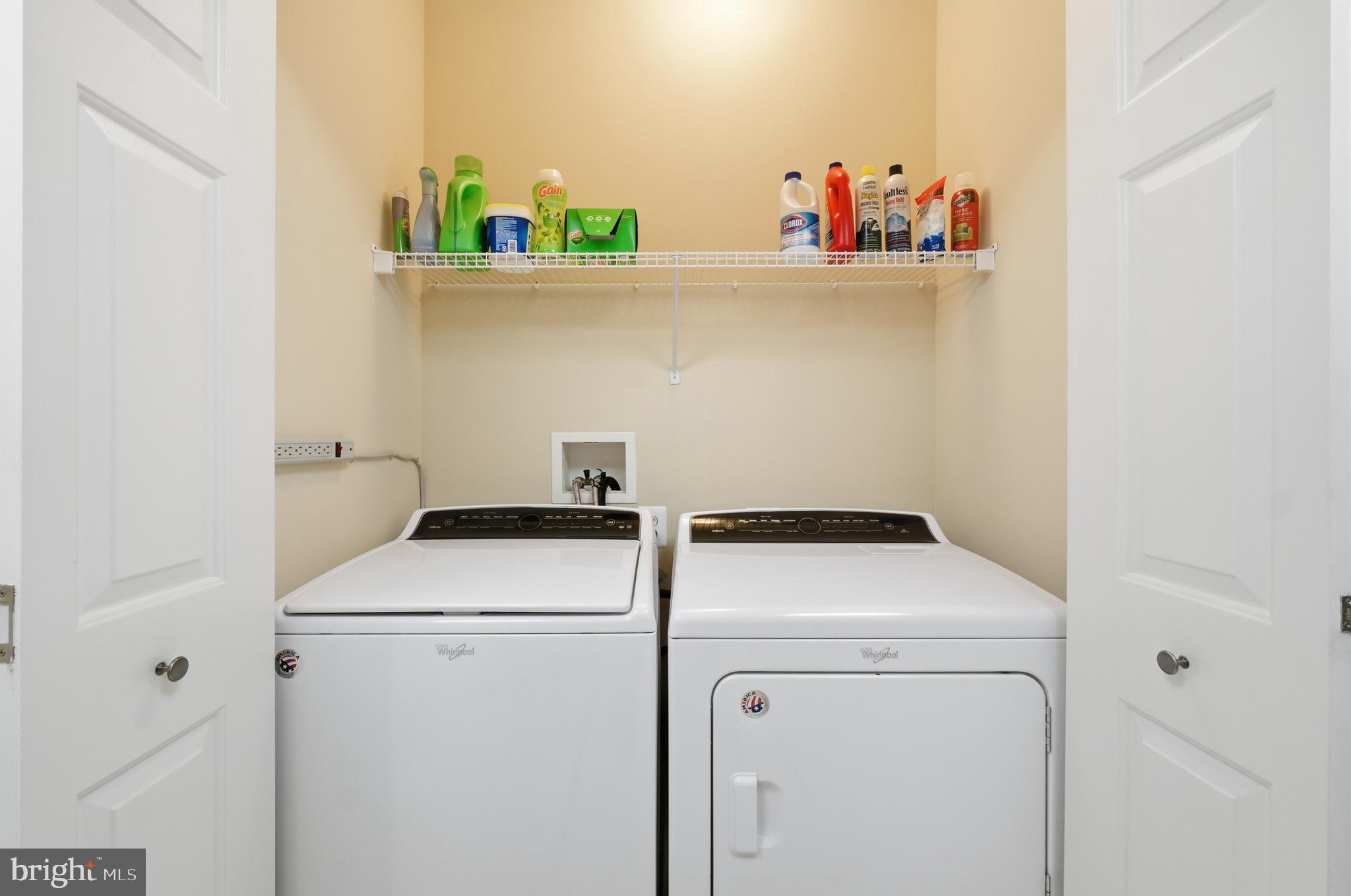 9613 Haven Farm Road, Unit 9613G Perry Hall, MD 21128 - Photo 33 of 37 a utility room with dryer and washer