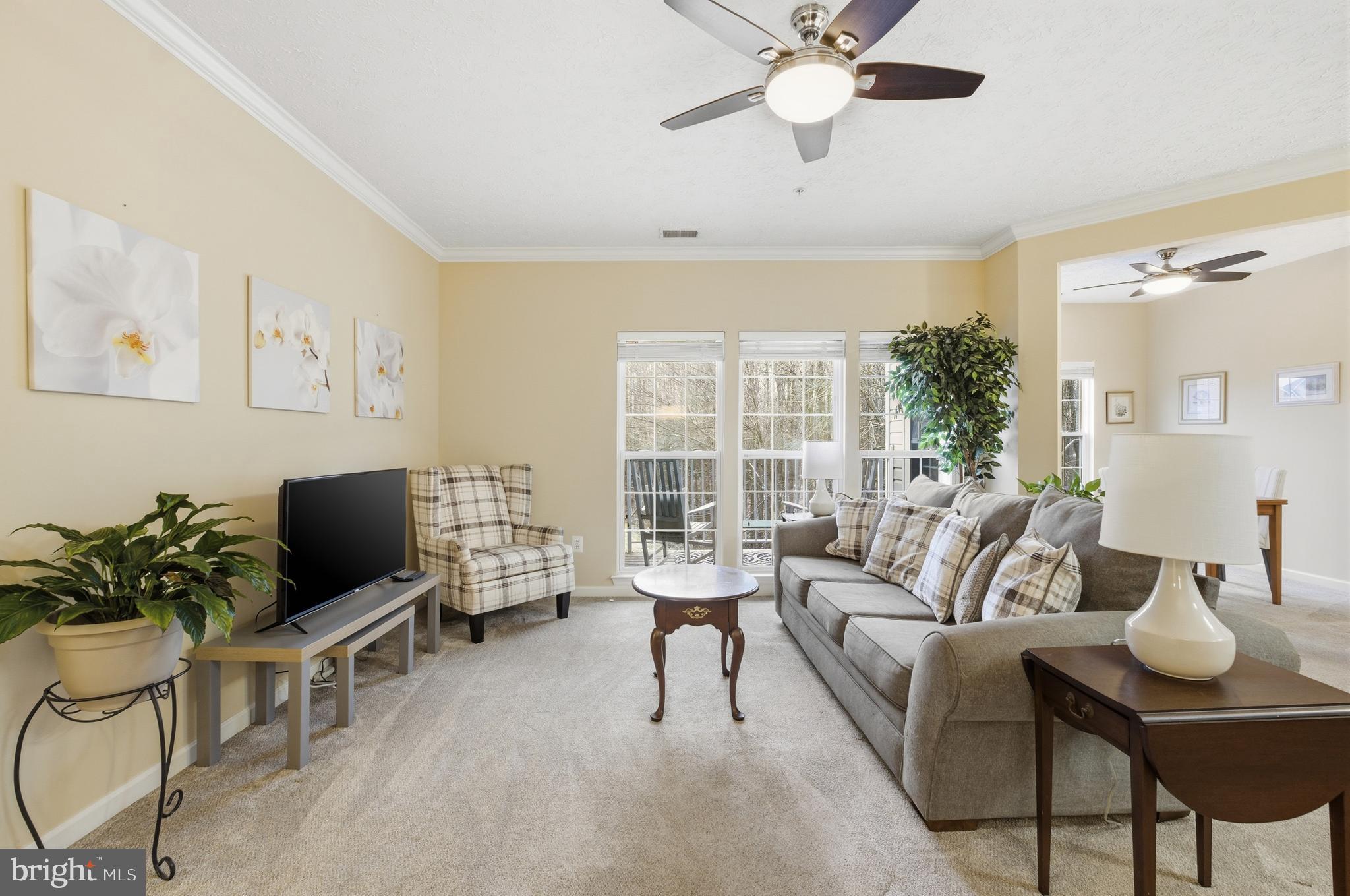 9613 Haven Farm Road, Unit 9613G Perry Hall, MD 21128 - Photo 4 of 37 a living room with furniture and a flat screen tv