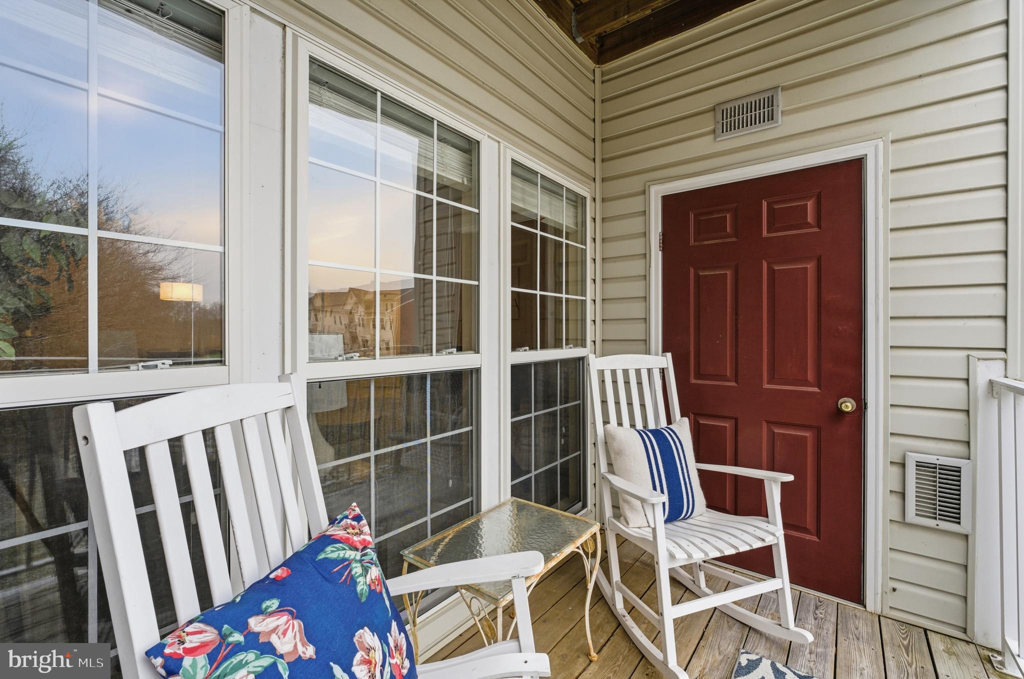 9613 Haven Farm Road, Unit 9613G Perry Hall, MD 21128 - Photo 7 of 37 a view of a balcony with chair and door