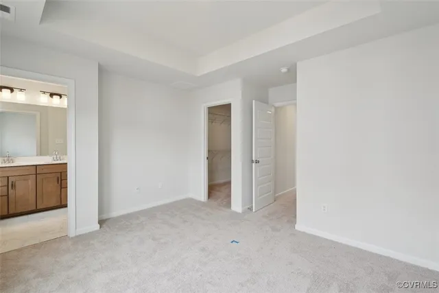 an empty room with a bathroom