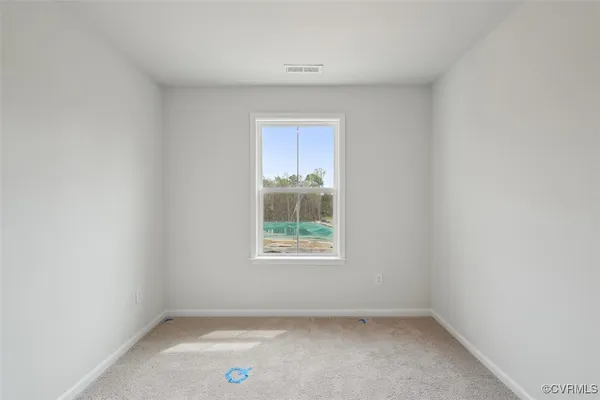 an empty room with a window