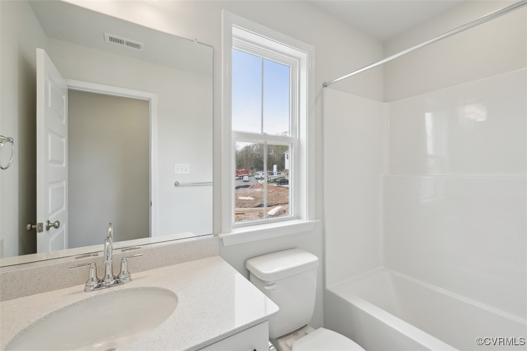 200 That Way Midlothian, VA 23114 - Photo 23 of 35 a bathroom with a sink toilet and shower