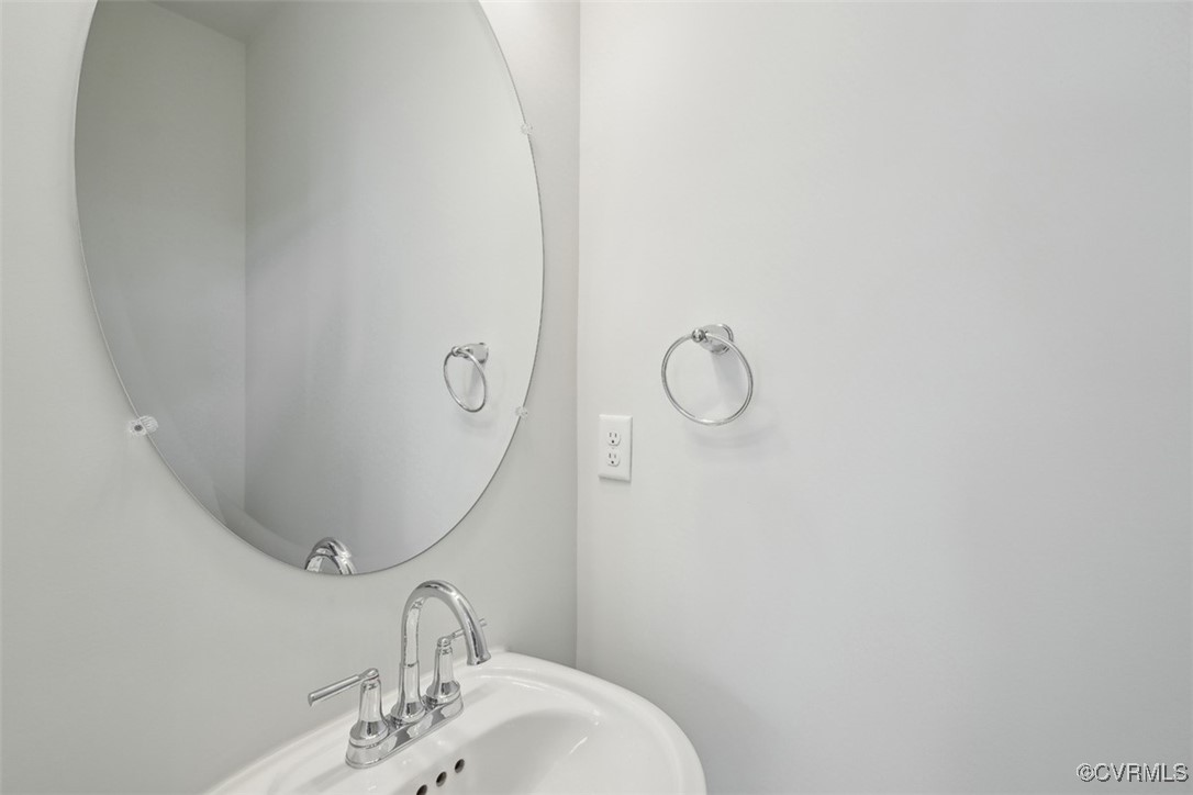 200 That Way Midlothian, VA 23114 - Photo 24 of 35 a bathroom with a sink and mirror