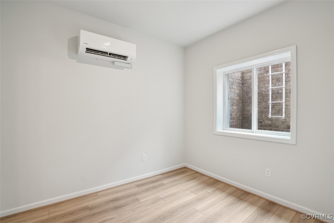 200 That Way Midlothian, VA 23114 - Photo 25 of 35 an empty room with a workbench
