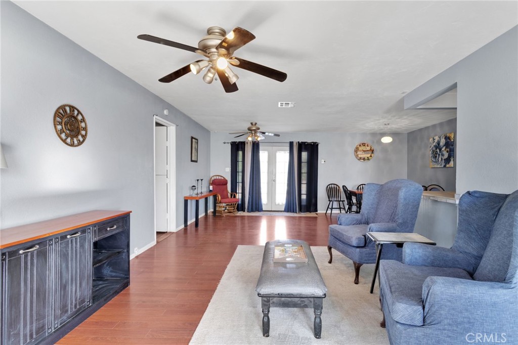 38744 East End Road Lucerne Valley, CA 92356 - Photo 12 of 46 a living room with furniture and a wooden floor