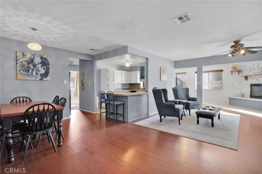 38744 East End Road Lucerne Valley, CA 92356 - Photo 15 of 46 a living room with furniture and kitchen view