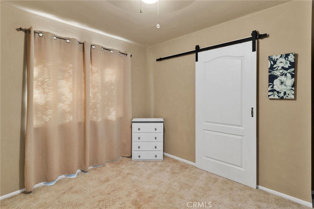 38744 East End Road Lucerne Valley, CA 92356 - Photo 23 of 46 a bathroom with a shower and a shower