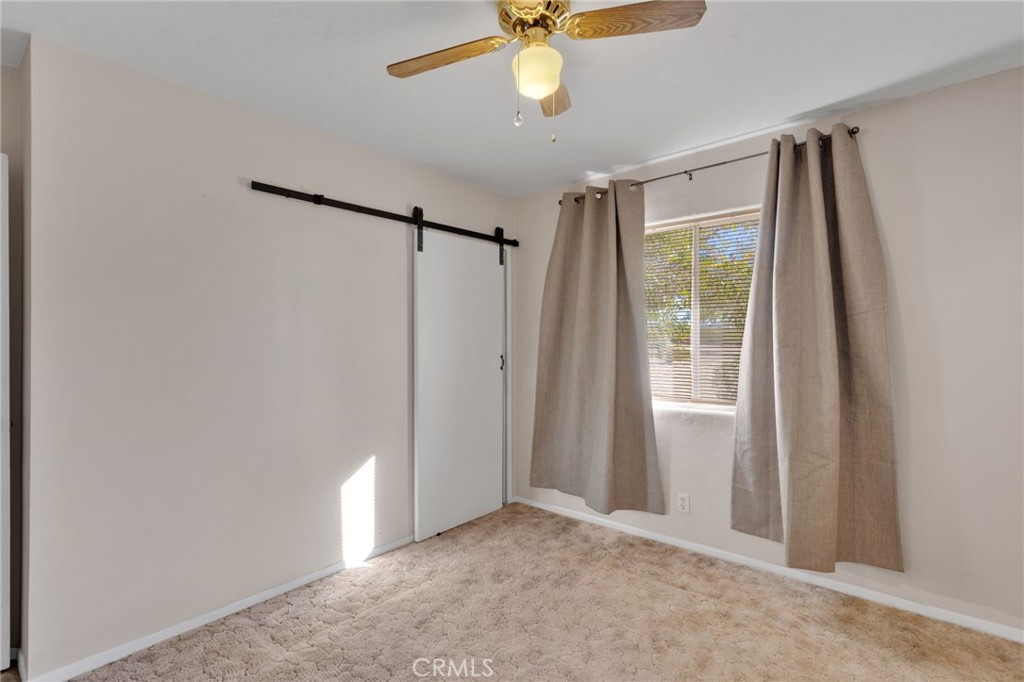 38744 East End Road Lucerne Valley, CA 92356 - Photo 25 of 46 a view of an empty room with a window