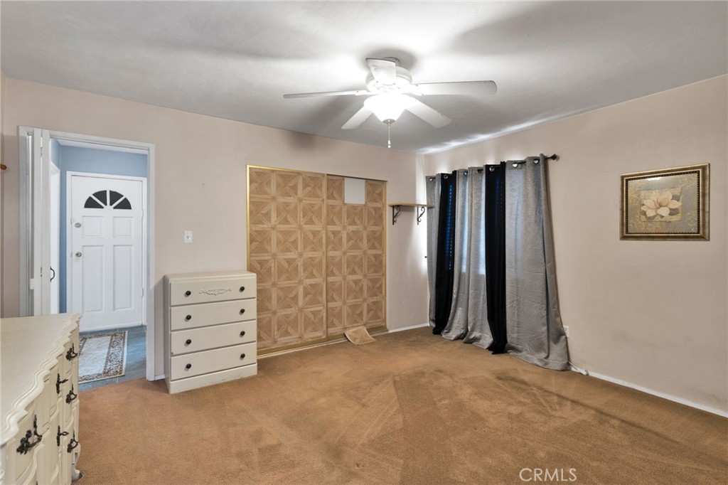 38744 East End Road Lucerne Valley, CA 92356 - Photo 28 of 46 a view of room with cabinet and air conditioner