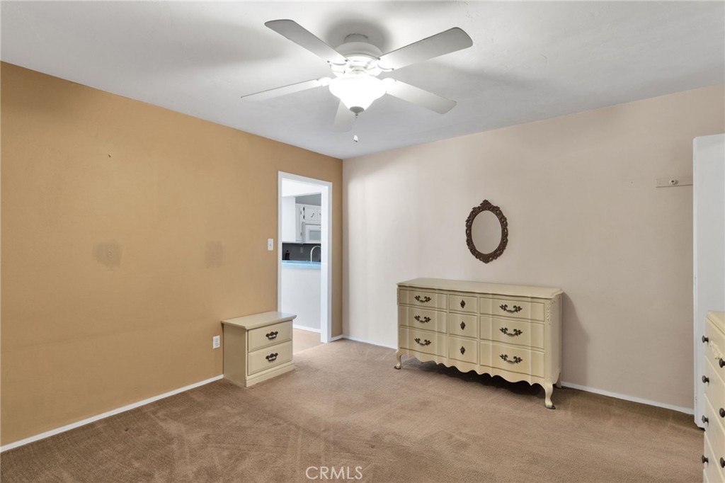 38744 East End Road Lucerne Valley, CA 92356 - Photo 29 of 46 an empty room with a dresser
