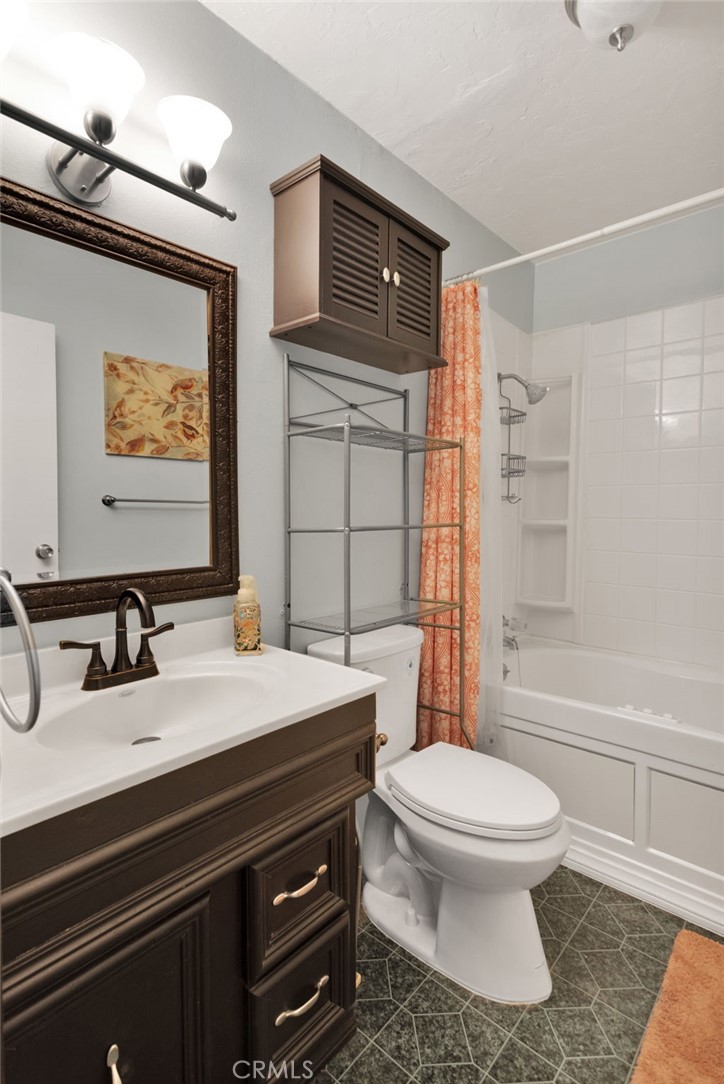 38744 East End Road Lucerne Valley, CA 92356 - Photo 32 of 46 a bathroom with a sink a toilet and shower