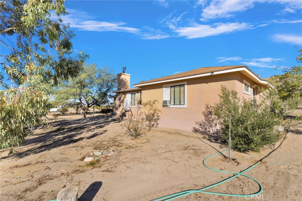 38744 East End Road Lucerne Valley, CA 92356 - Photo 10 of 46 a view of a backyard of the house