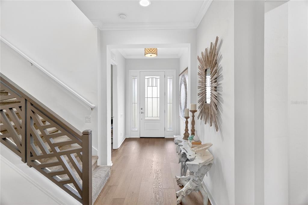 3363 Southwest 115th Terrace Gainesville, FL 32608 - Photo 19 of 43 a view of entryway with wooden floor