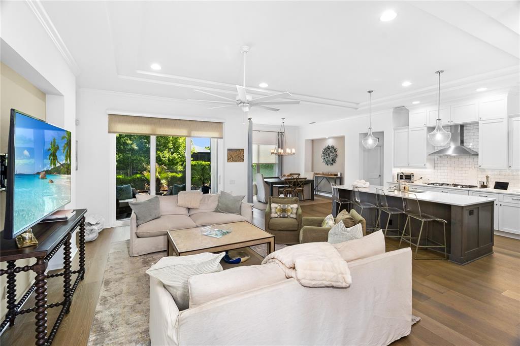 3363 Southwest 115th Terrace Gainesville, FL 32608 - Photo 3 of 43 a living room with furniture and kitchen view