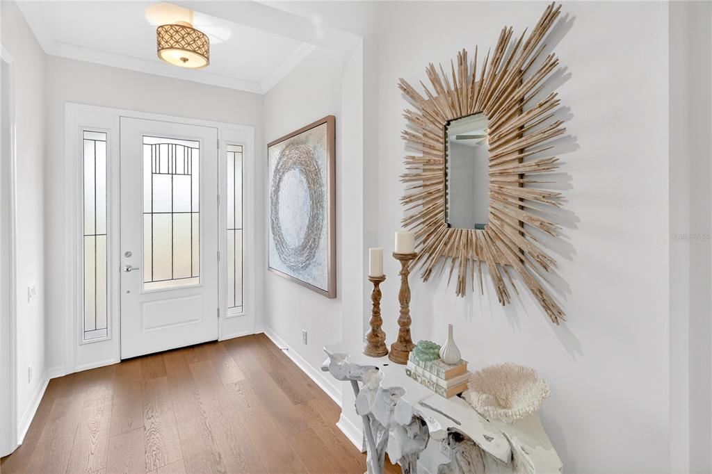 3363 Southwest 115th Terrace Gainesville, FL 32608 - Photo 31 of 43 a view of a hallway to a livingroom with furniture