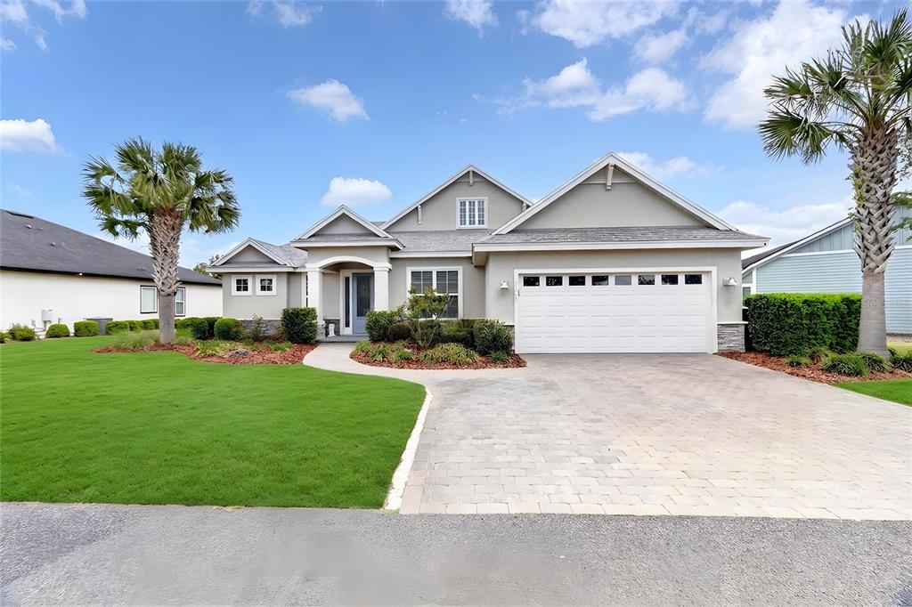 3363 Southwest 115th Terrace Gainesville, FL 32608 - Photo 41 of 43 front view of a house with a yard