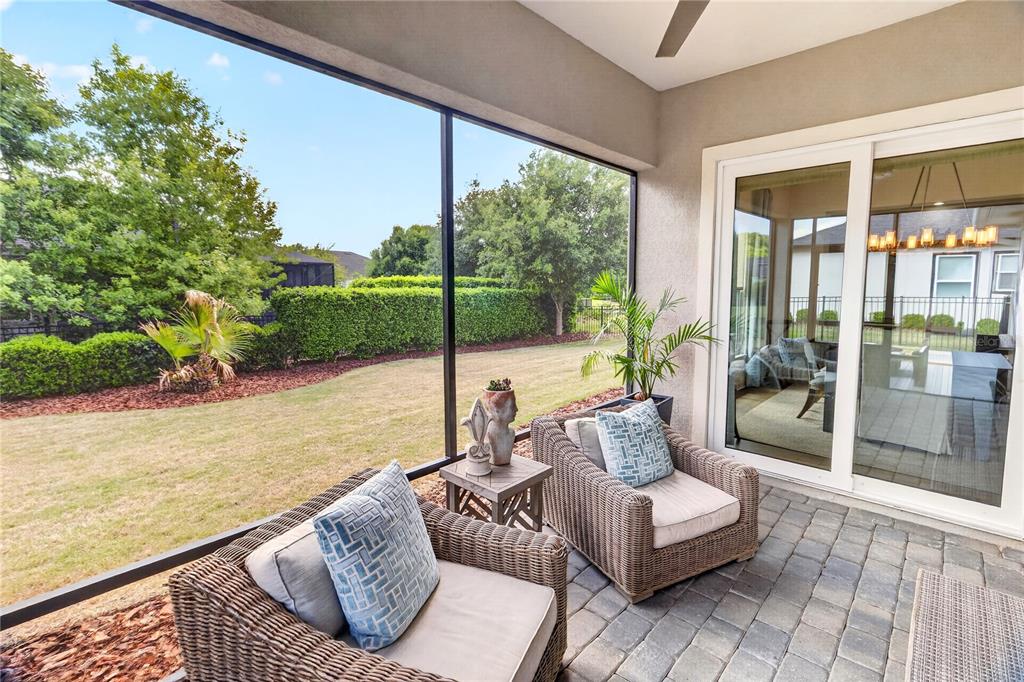3363 Southwest 115th Terrace Gainesville, FL 32608 - Photo 7 of 43 a outdoor living space with furniture and garden view