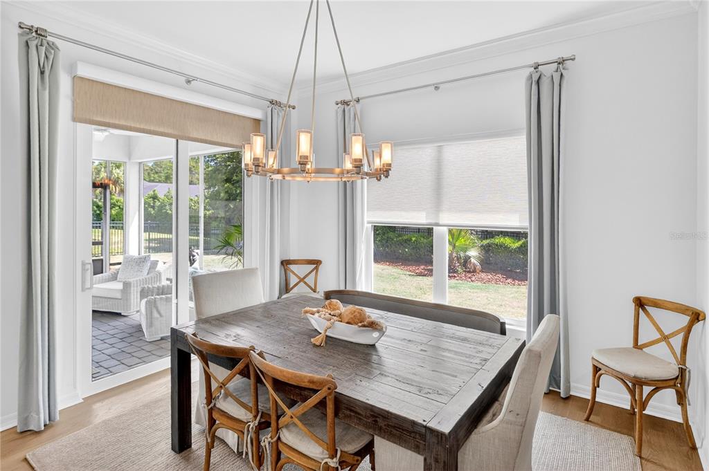 3363 Southwest 115th Terrace Gainesville, FL 32608 - Photo 10 of 43 a view of a dining room with furniture window and outside view