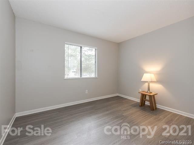 10961 Harrowfield Road Charlotte, NC 28226 - Photo 7 of 13 a room with a bed and a window