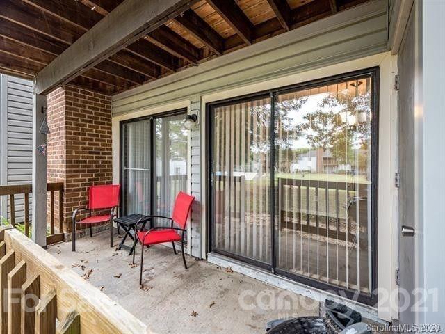 10961 Harrowfield Road Charlotte, NC 28226 - Photo 9 of 13 a view of a swimming pool with a lounge chairs
