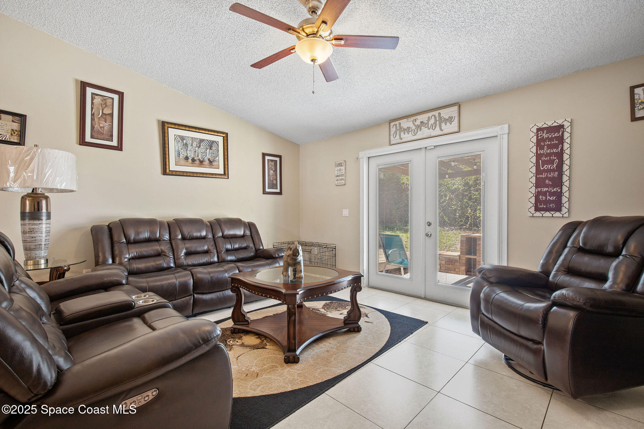 2977 Sebastian Lane Melbourne, FL 32935 - Photo 11 of 26 a living room with furniture and a window
