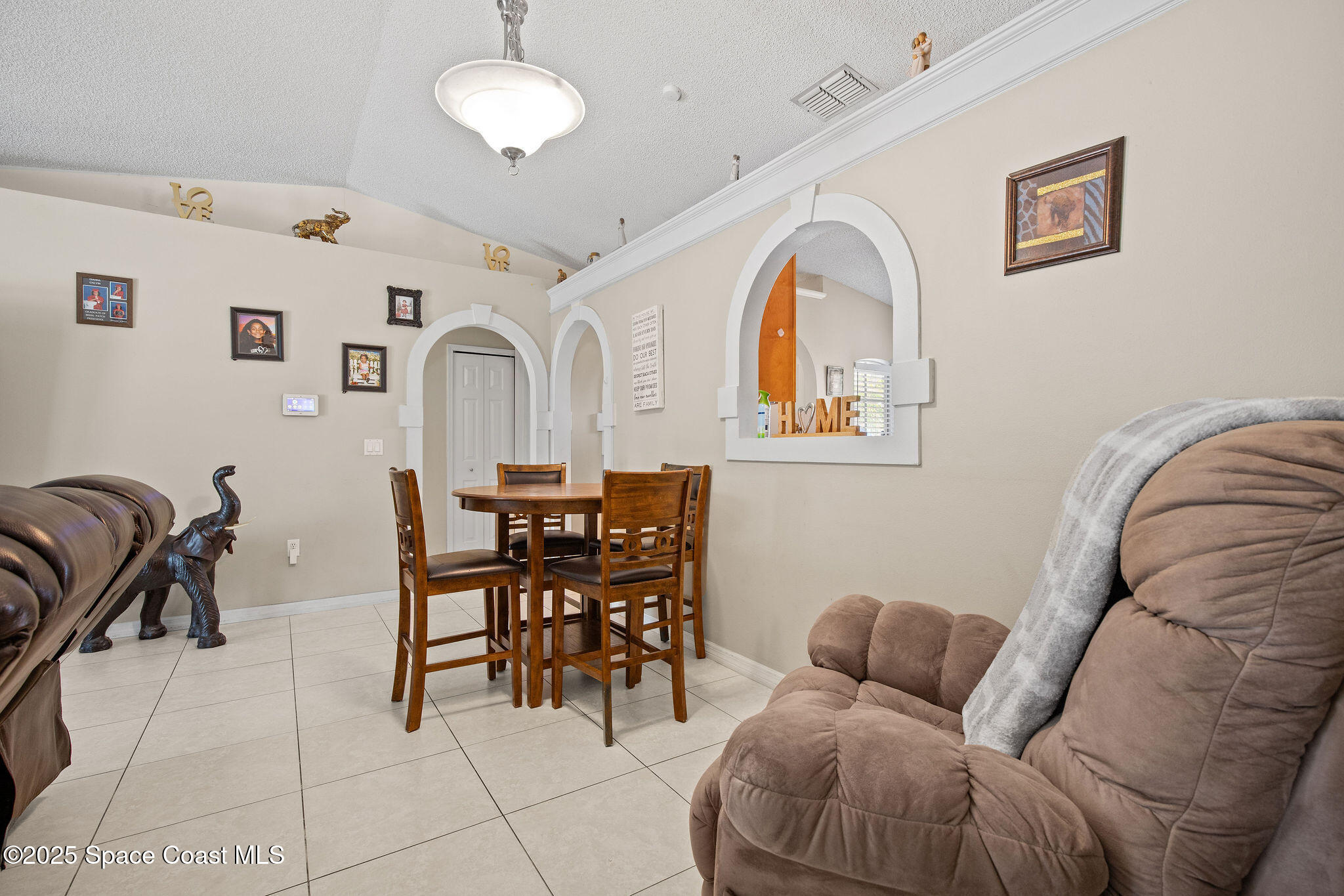 2977 Sebastian Lane Melbourne, FL 32935 - Photo 10 of 26 a living room with furniture