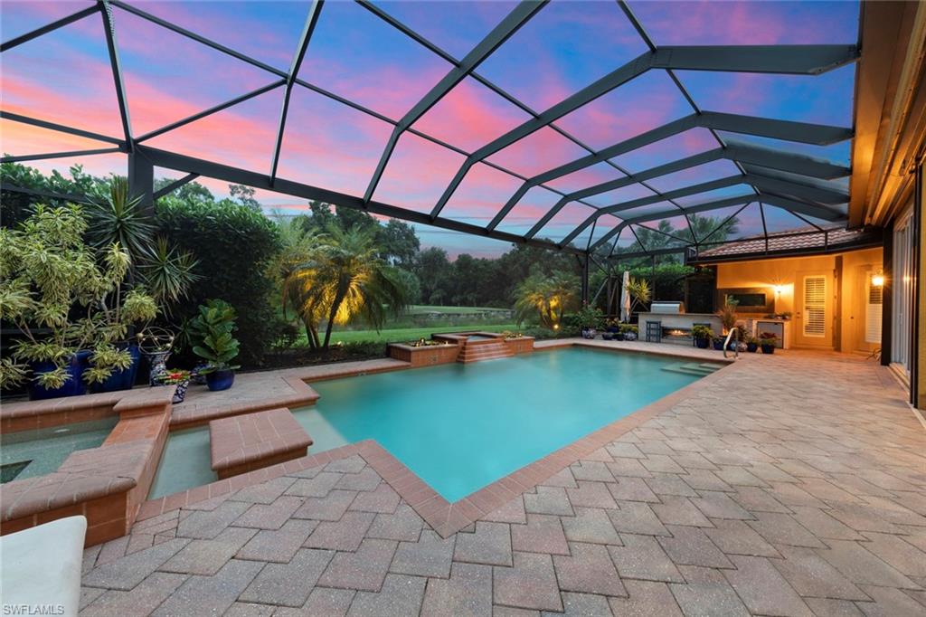 20008 Oak Fairways Court Estero, FL 33928 - Photo 33 of 49 a view of a swimming pool with a patio