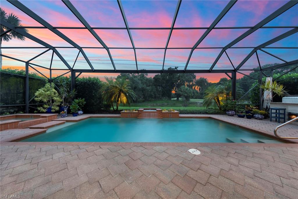20008 Oak Fairways Court Estero, FL 33928 - Photo 34 of 49 a view of a swimming pool with a patio