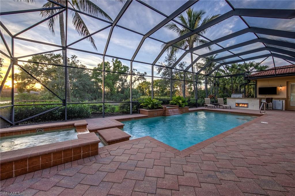 20008 Oak Fairways Court Estero, FL 33928 - Photo 36 of 49 a view of a swimming pool with a patio