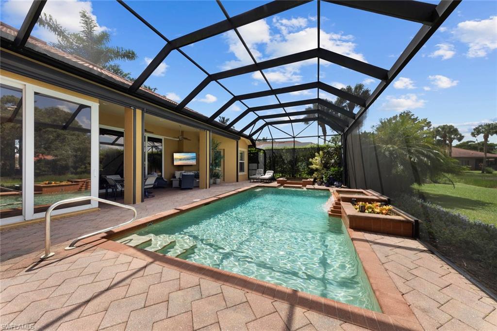 20008 Oak Fairways Court Estero, FL 33928 - Photo 38 of 49 a front view of a house with a yard