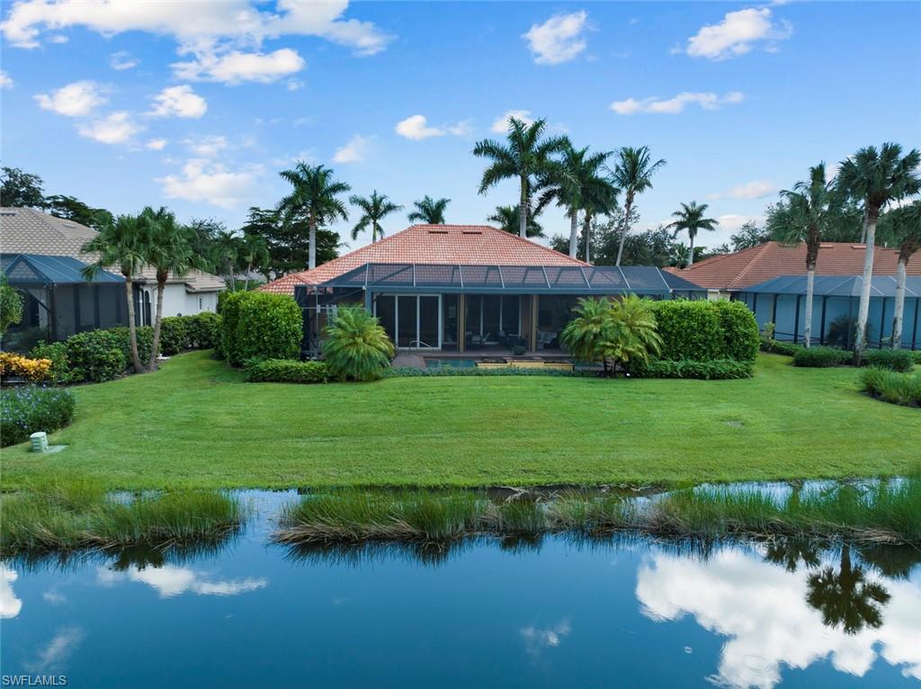 20008 Oak Fairways Court Estero, FL 33928 - Photo 42 of 49 a view of a garden with a lake view
