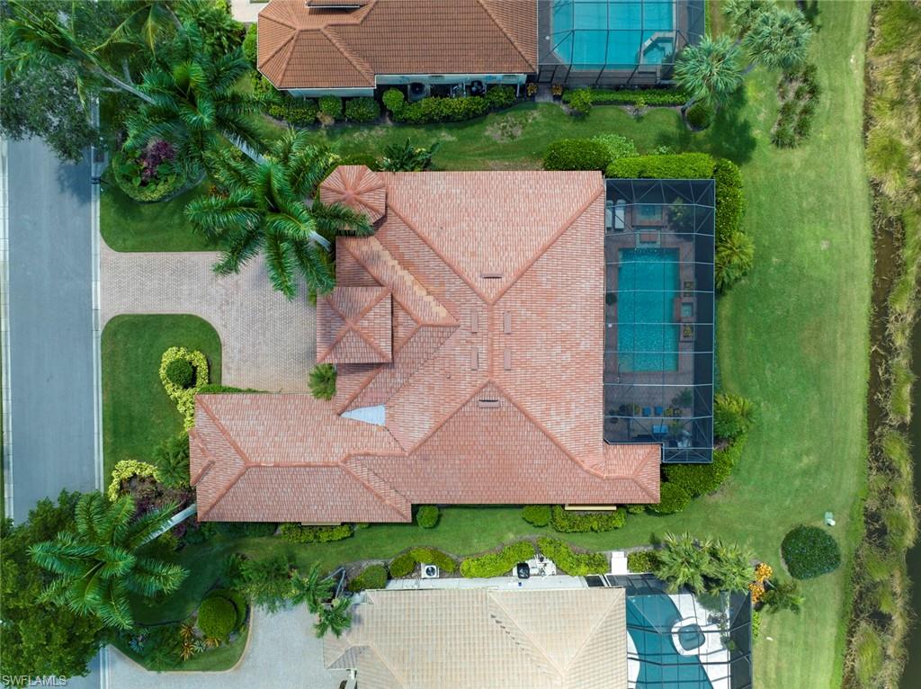 20008 Oak Fairways Court Estero, FL 33928 - Photo 43 of 49 an aerial view of a house with garden space and a street view