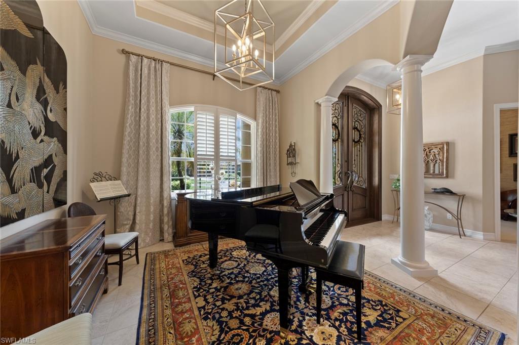 20008 Oak Fairways Court Estero, FL 33928 - Photo 5 of 49 a view of a livingroom with furniture and a window