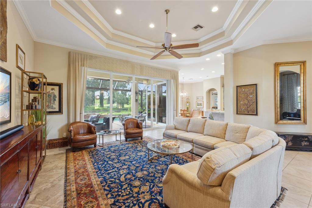 20008 Oak Fairways Court Estero, FL 33928 - Photo 9 of 49 a living room with furniture and a large window