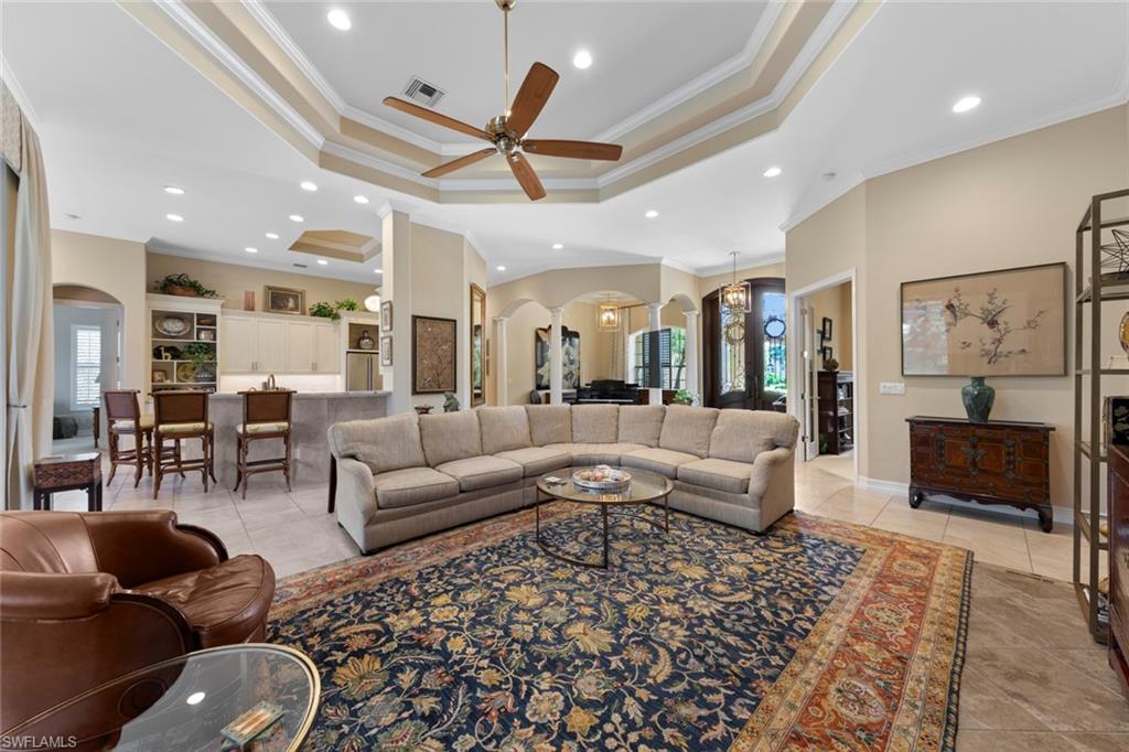 20008 Oak Fairways Court Estero, FL 33928 - Photo 10 of 49 a living room with furniture and a view of kitchen