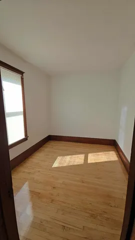 a view of an empty room and window