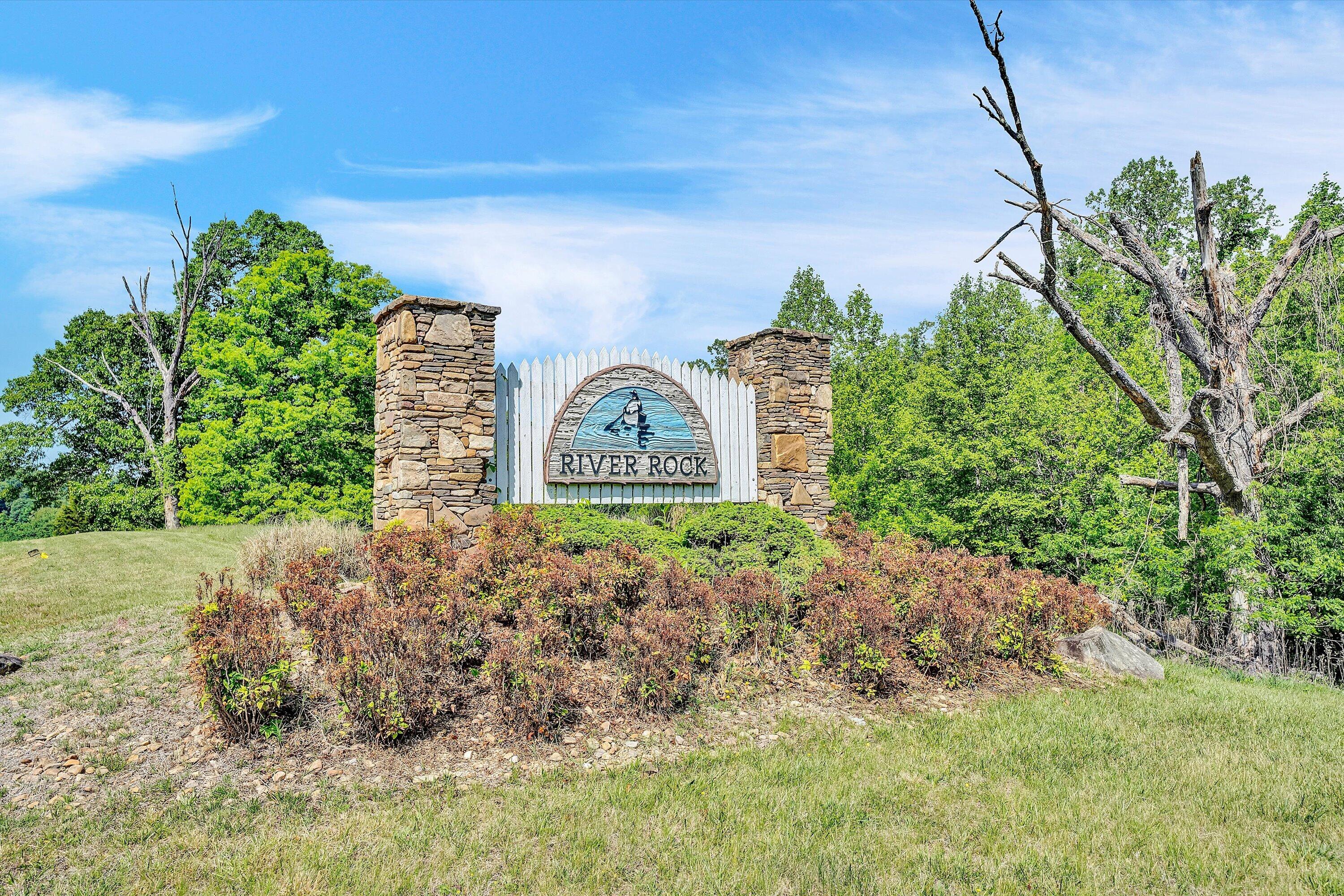 Lot 27 River Rock Road Vinton, VA 24179 - Photo 20 of 28 a sign that is on a brick wall