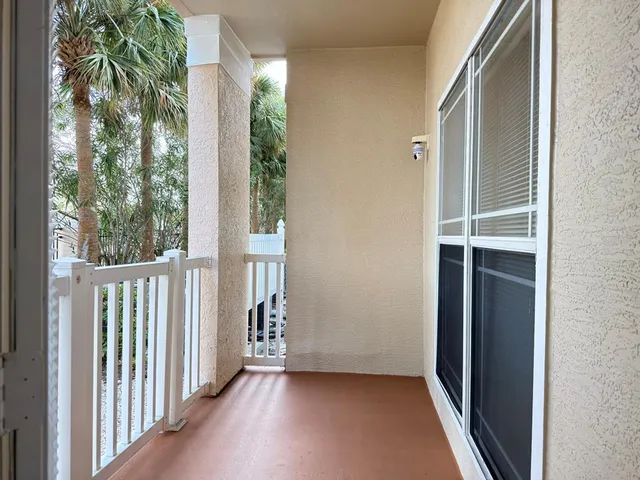 a view of a building with a swimming pool