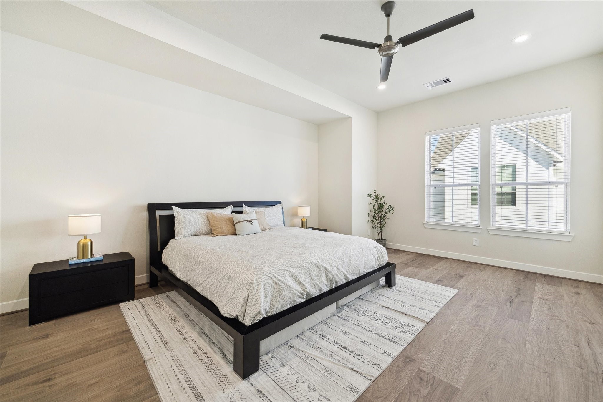 10616 Cascade Ledge Lane Houston, TX 77025 - Photo 11 of 20 The spacious primary suite offers plenty of room for a full furniture set and relaxing natural light.