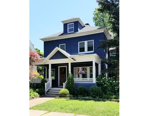 27 Mountainview Street Springfield, MA 01108 - Photo 1 of 20 a front view of a house with garden