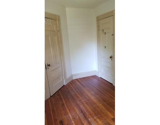 27 Mountainview Street Springfield, MA 01108 - Photo 17 of 20 a view of an empty room with wooden floor