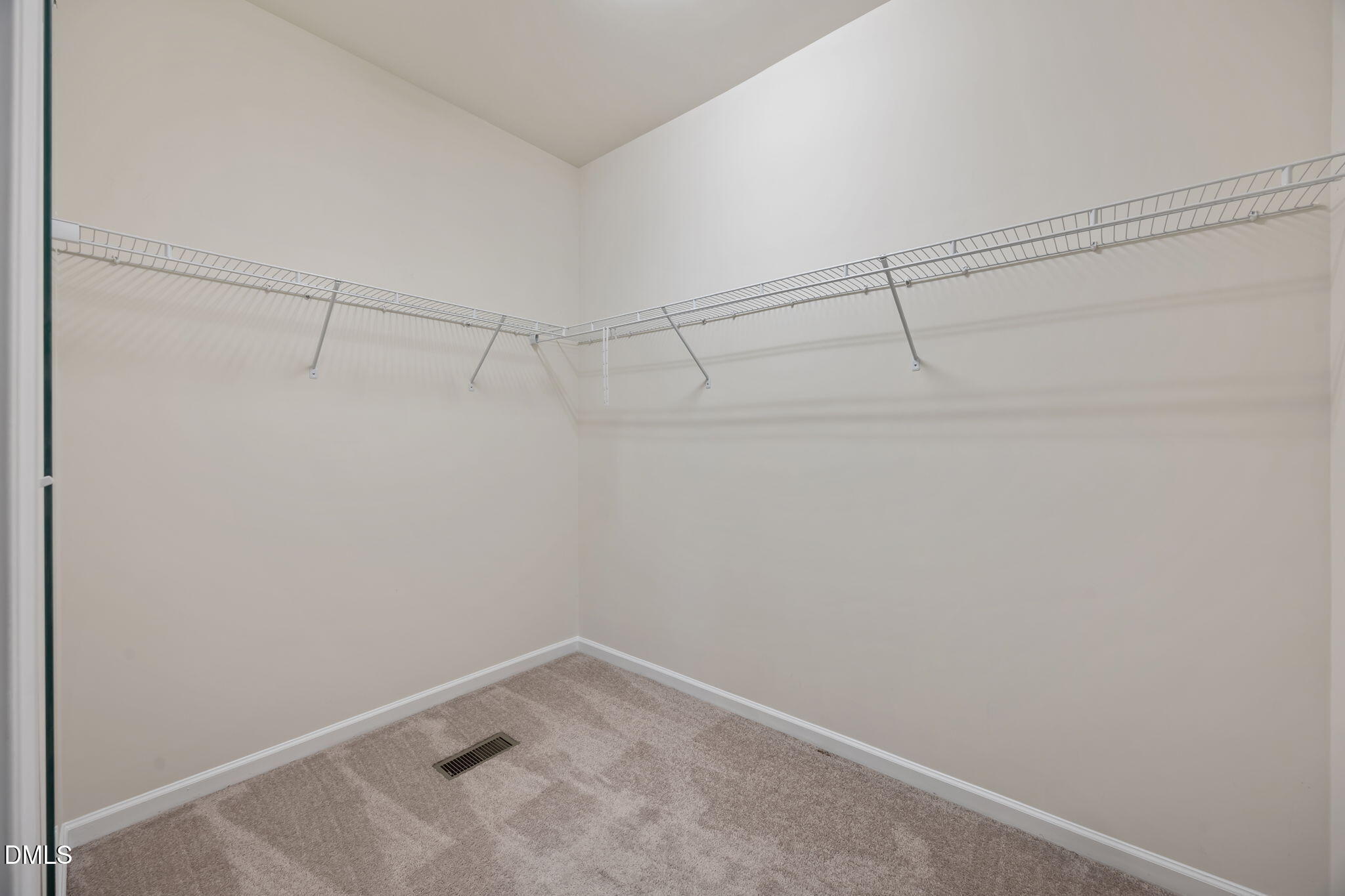 1005 Epiphany Road Morrisville, NC 27560 - Photo 14 of 23 a view of a room with racks on the wall