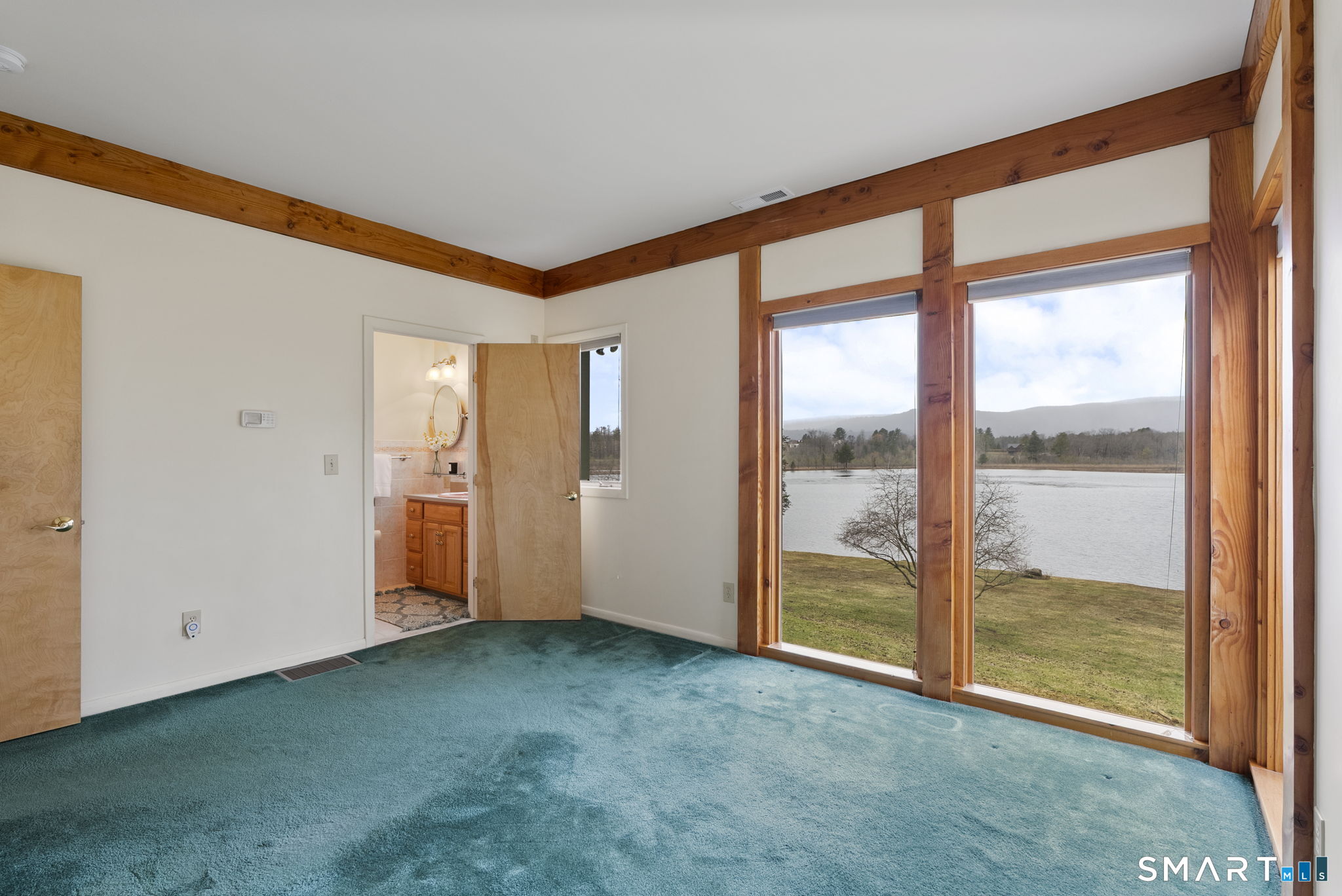 99 Washinee Heights Road Salisbury, CT 06068 - Photo 17 of 34 Bedroom on main level with ensuite bath