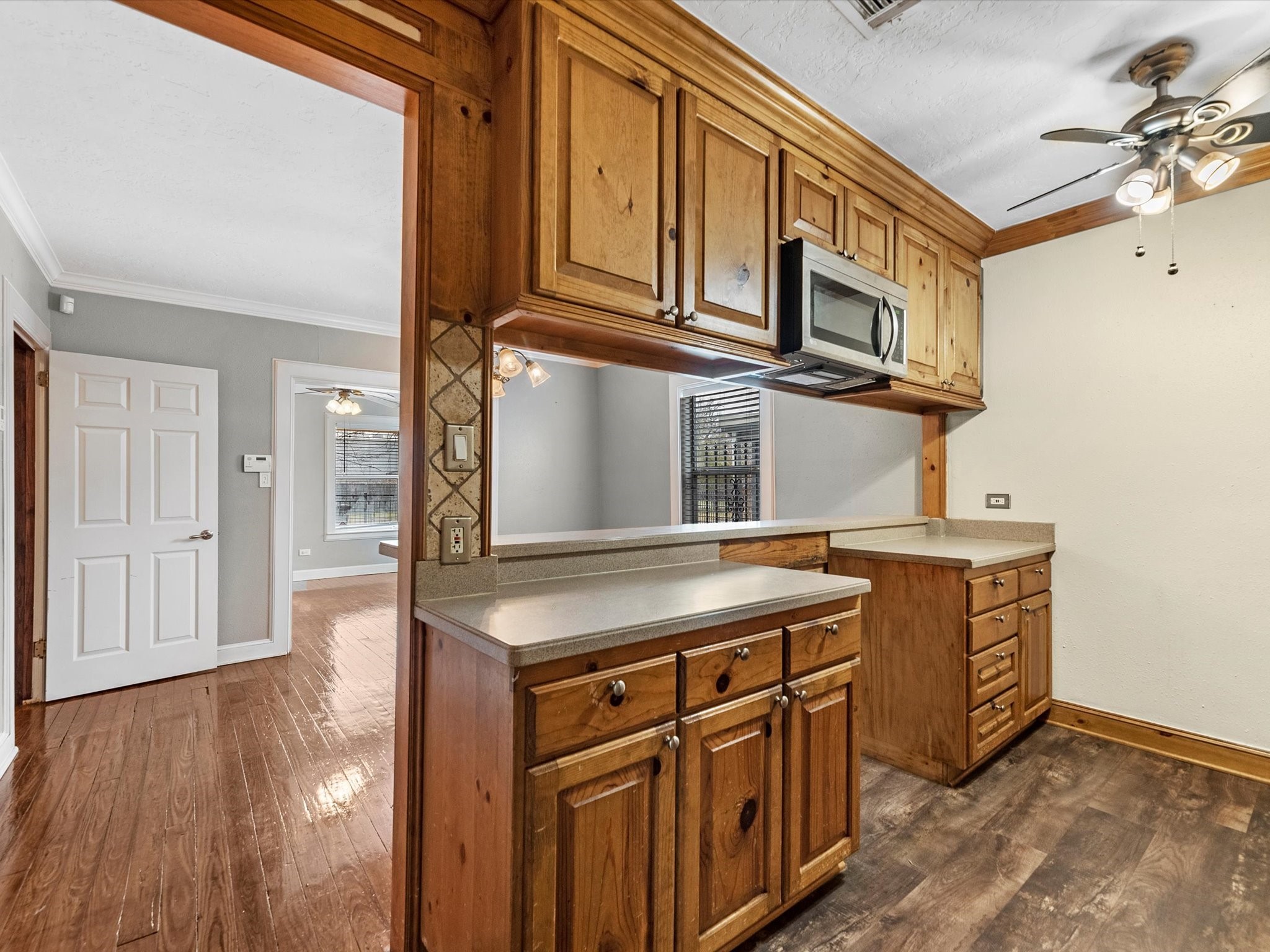 1211 Bigelow Street Houston, TX 77009 - Photo 7 of 18 a kitchen with stainless steel appliances granite countertop a sink and cabinets