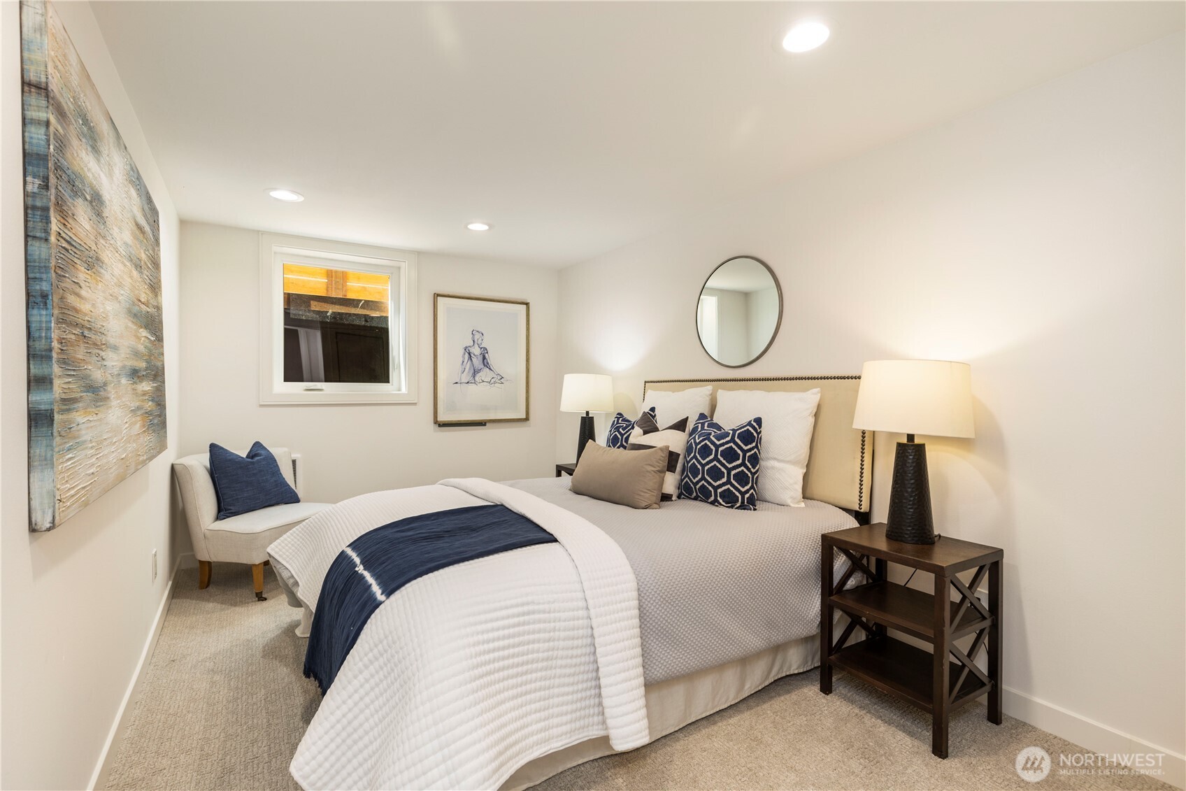 828 Northeast 95th Street Seattle, WA 98115 - Photo 14 of 18 a bedroom with a bed and window