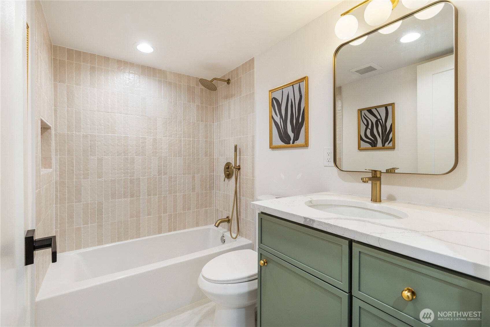 828 Northeast 95th Street Seattle, WA 98115 - Photo 16 of 18 a bathroom with a sink a toilet and a bathtub
