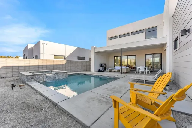 a bathroom with a granite countertop sink a shower and a mirror