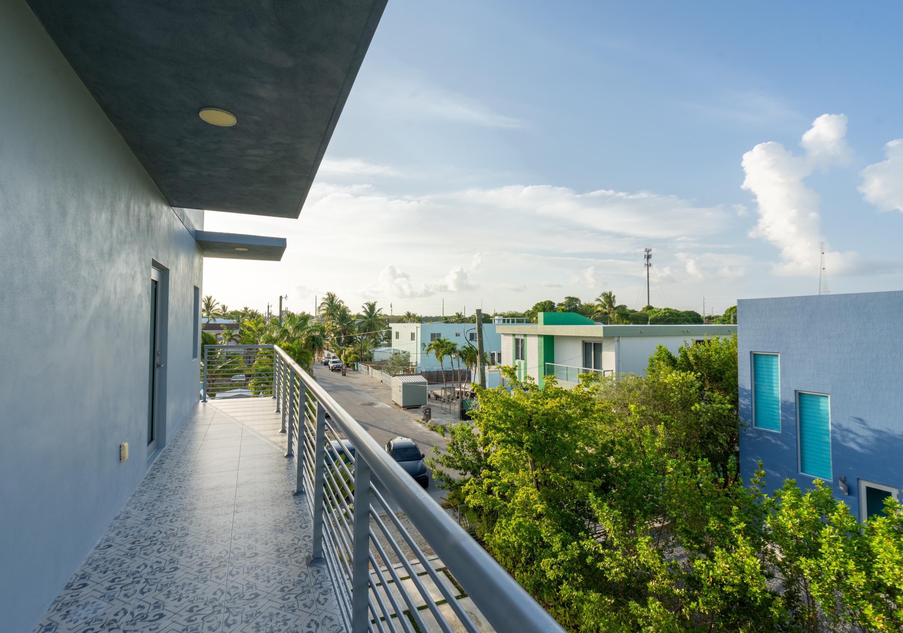 475 Bahia Honda Road Key Largo, FL 33037 - Photo 47 of 134 a view of a balcony with an outdoor space