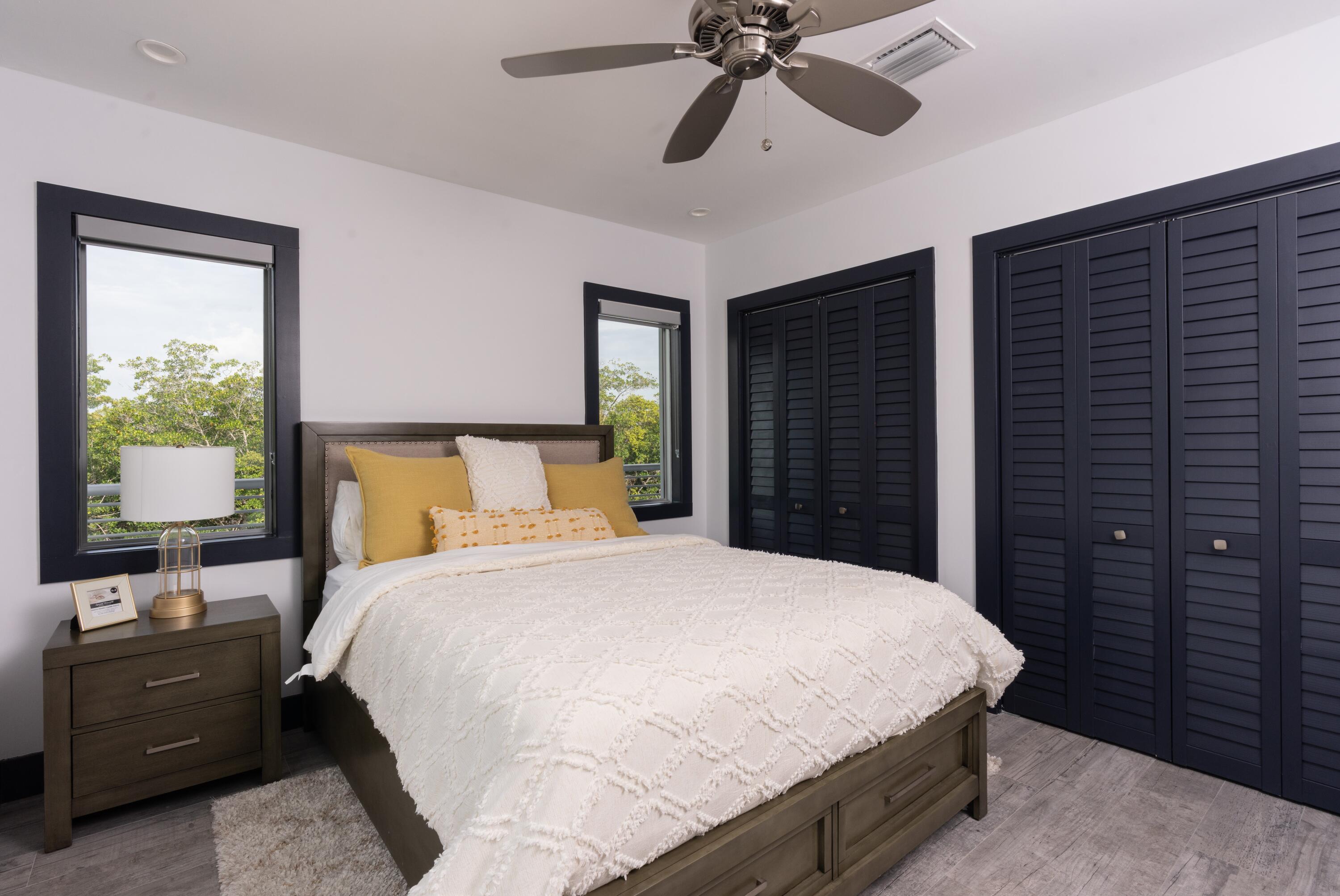 475 Bahia Honda Road Key Largo, FL 33037 - Photo 72 of 134 a bedroom with a bed and a closet