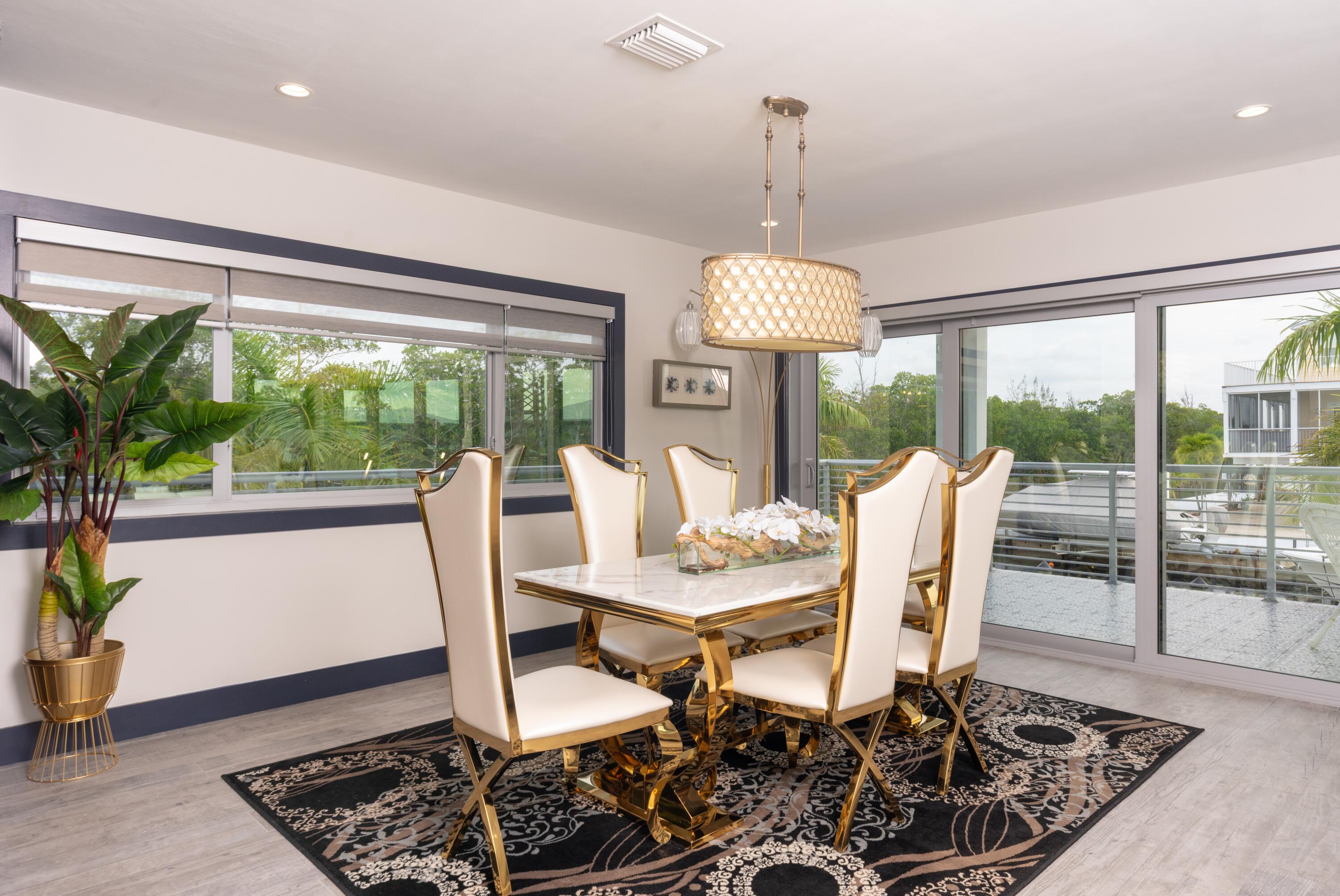 475 Bahia Honda Road Key Largo, FL 33037 - Photo 78 of 134 a view of a dining room with furniture window and outside view